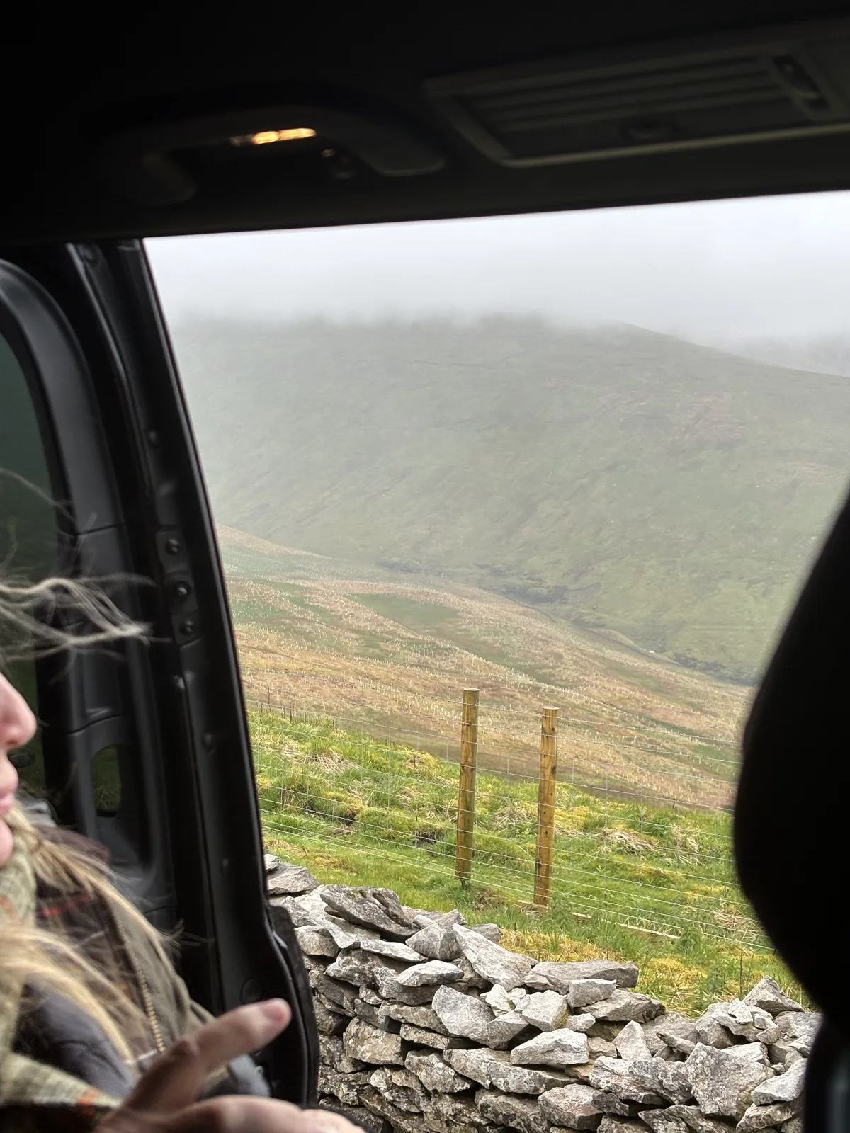 Guests taking in a sweeping Yorkshire Dales view on their private day tour